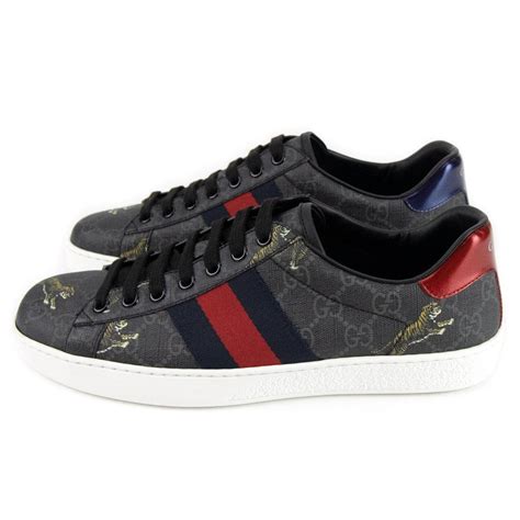 gucci tiger print trainers|Gucci tiger.